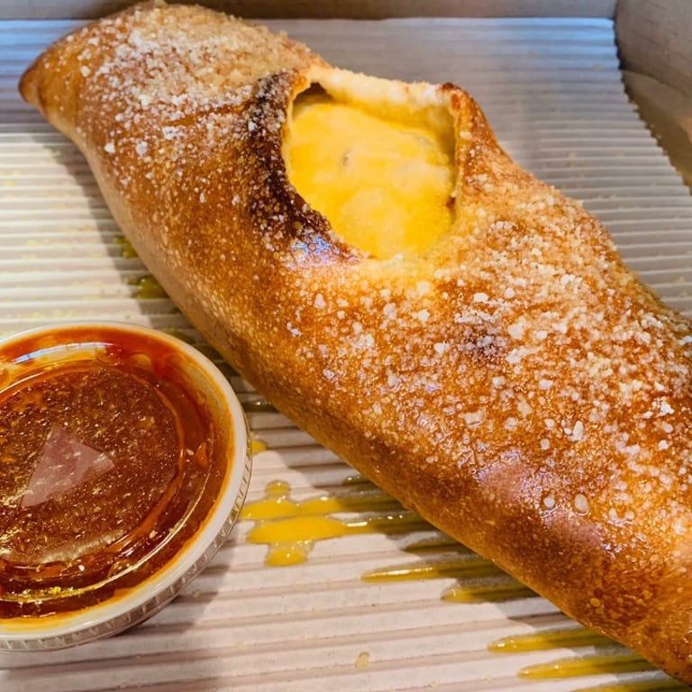 Savor Our Authentic Stromboli